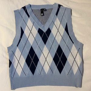 Garage sweater vest